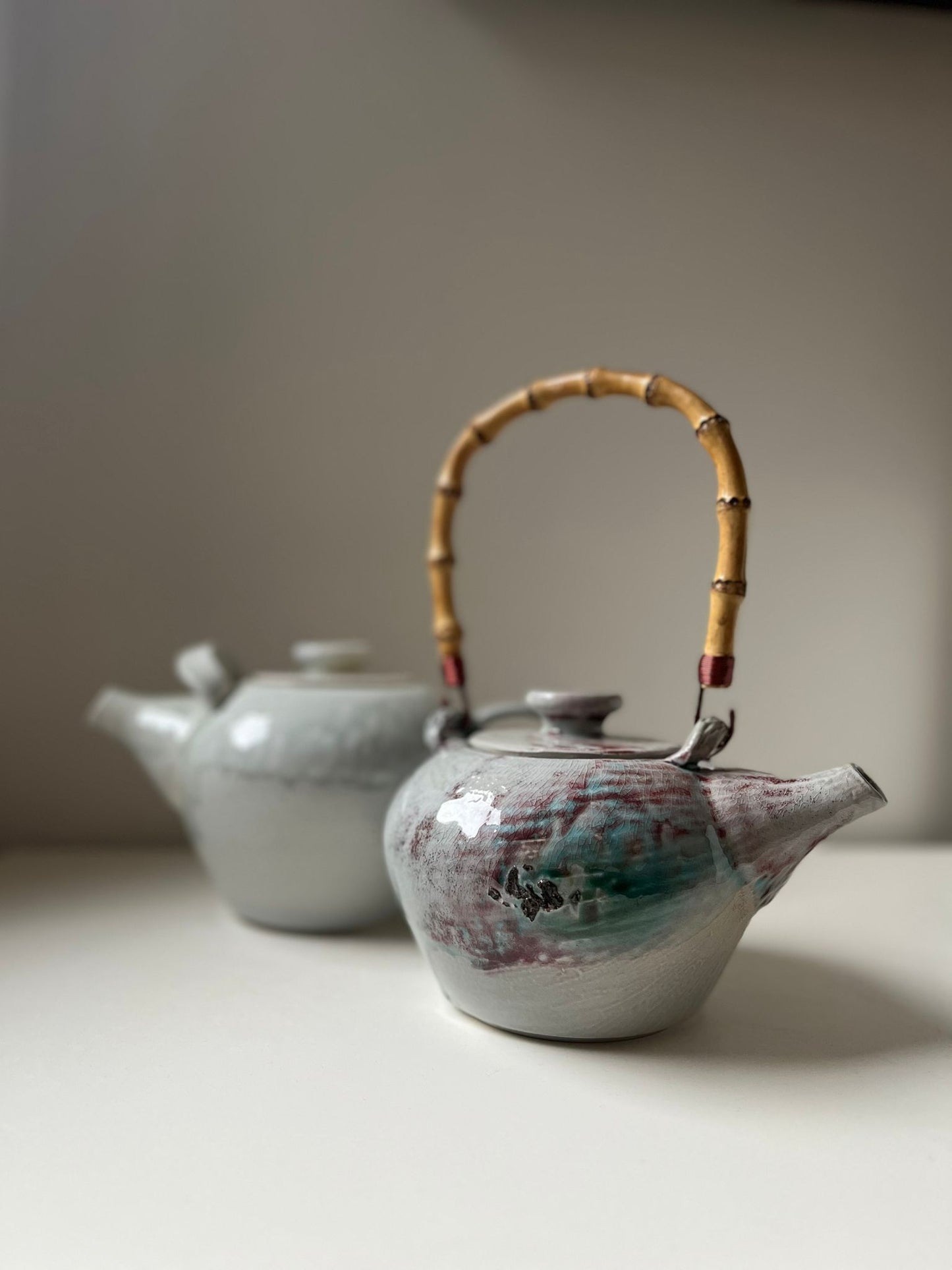Salt fired teapot with cane handle